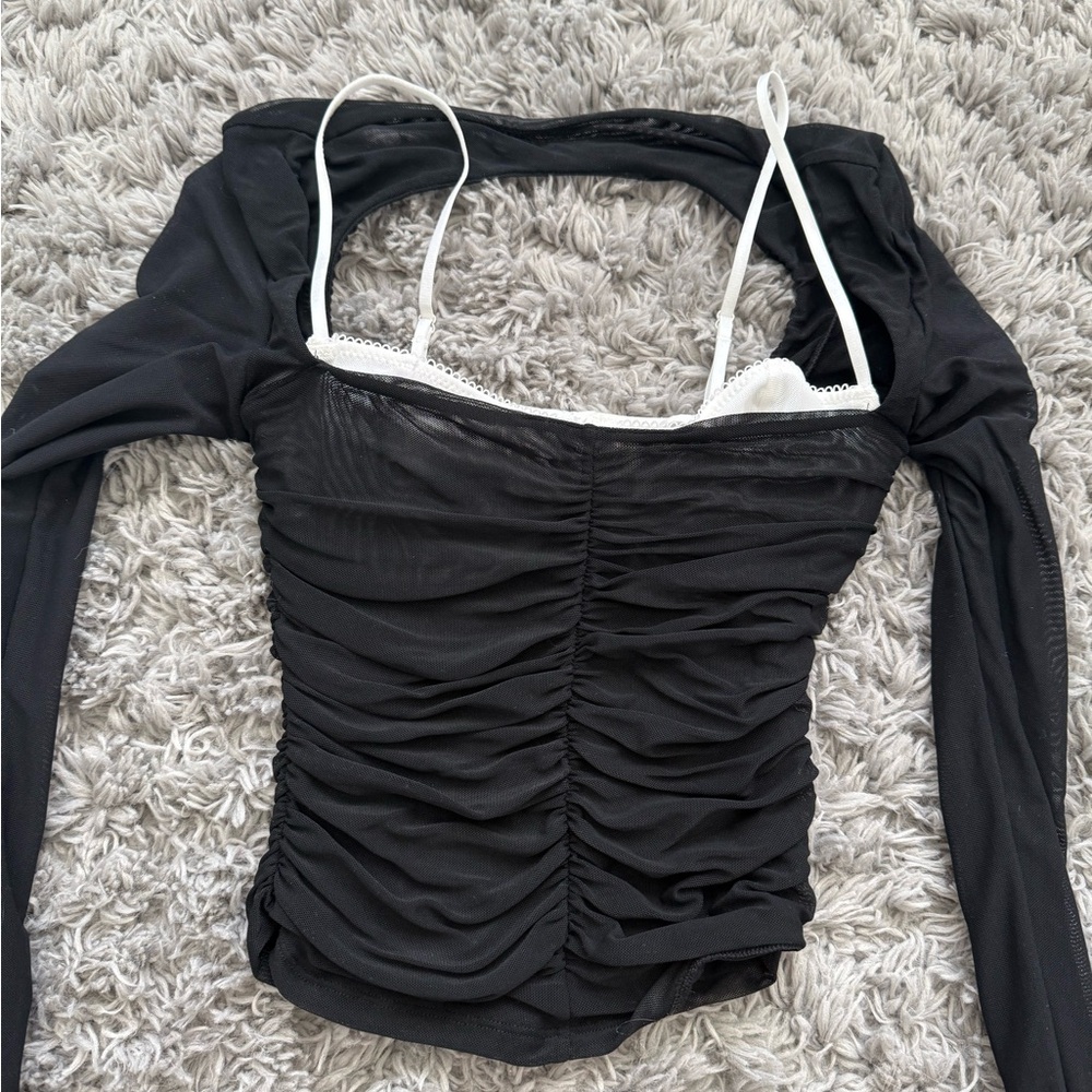 Black long sleeve with built-in white lace bra